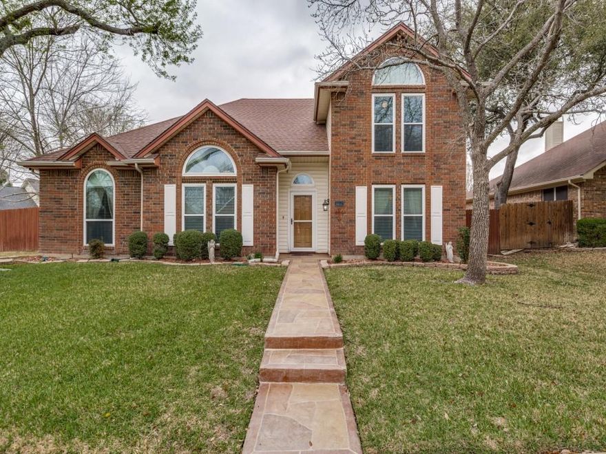 Welcome to this beautifully maintained 4-bedroom, 2.5-bath home in the heart of Rowlett, TX, offering the perfect blend of space, comfort, and convenience. Step inside through a gracious foyer that opens to elegant formal living and dining rooms, ideal for entertaining or hosting special gatherings. The home features a spacious first-floor primary suite with an updated ensuite bathroom, creating a relaxing private retreat. Upstairs, you’ll find two bedrooms along with a versatile loft-style fourth bedroom with an opening overlooking the downstairs, currently used as a home office and complete with a built-in desk, making it perfect for remote work, study, or creative space. The sizable kitchen flows seamlessly into the main living area, creating an open and welcoming environment for everyday living and entertaining. Outside, enjoy a huge oversized lot with plenty of room to relax, play, or garden. The backyard is designed for outdoor living, featuring a spacious patio and a charming gazebo—perfect for relaxing evenings, outdoor dining, or entertaining guests. The property also includes a 2-car garage with custom cabinets and several valuable updates, including: Roof approximately 8 years old; newer energy-efficient windows; and gutter leaf guards for low maintenance. The location is hard to beat, with easy access to shopping, dining, George Bush Freeway, and Lake Ray Hubbard. You'll also love being within walking distance to both Springfield Lake Park—where you can enjoy scenic jogging and bike trails along with peaceful fishing ponds—and the local elementary school, adding everyday convenience for families. This home offers space, flexibility, and an unbeatable location—perfect for those looking to enjoy the best of Rowlett living.