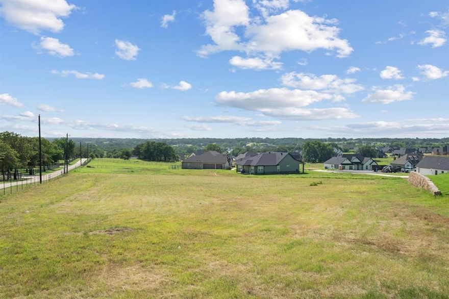 Build Your Dream Home on 1.265 acres in The Ranches at Valley in Springtown, TX! This beautiful homesite offers a peaceful country setting with modern neighborhood appeal, perfect for creating your custom dream home with open views and gentle topography. Located in a community of custom homes with pride of ownership throughout. No City Taxes. Approved Plat and CCRs available. Septic system required; water and electric available. MTX Custom Homes available to build on-site (not required), house plans available upon request. Whether you're ready to build now or want to invest for the future, this lot offers the perfect canvas.