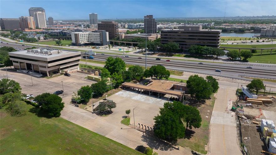 1.22 acres. Great location on 114 in Las Colinas. Was a Chase drive-through. Deed restricted now and can not be a bank. 
Survey is in documents.