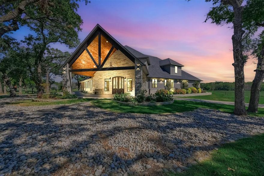 Stunning 5-Bedroom Estate on 34 Acres. This beautiful 2021-custom built home has an open floor plan is amazing. Enjoy the gourmet kitchen & high-end finishes. The luxurious master suite features a spa-like bath with modern fixtures & walk-in shower. 100 year old reclaimed doors throughout. Enjoy a amazing custom pool with fire bowls & water features, perfect for entertaining, all overlooking a serene, stocked pond for fishing or relaxing. This property offers ample room to design your own horse facility with grazing areas. A charming 2-bedroom guest house provides space for visitors or extended family, with its own kitchen & living area for comfort. There is a great SHOP already in place. Well water with reverse osmosis, city water hook up available at entrance. Plenty of privacy, yet still within minutes of town. Experience the ideal blend of luxury, nature, & tranquility in the heart of horse country this is your Texas dream home. Enjoy seeing the wildlife in the park like setting.