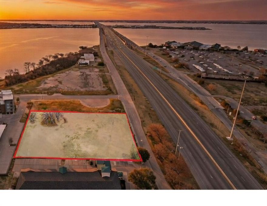 This 51,584 SF commercially zoned lot boasts exceptional visibility along the newly completed I-30 frontage road, capturing heavy local and regional traffic. Cross-access to the adjacent Quality Inn enhances connectivity and shared flow. Located just 0.5 miles west of Sapphire Bay—a $1B, 116-acre mixed-use powerhouse featuring a 500-room Hyatt hotel and conference center—the site leverages robust visitor, corporate, and leisure demand. Ideal for hospitality, medical offices, retail, or entertainment, it captures valuable spillover from events and guests. Directly across Lake Ray Hubbard on I-30 sits The Harbor, with Harbor Heights (recently completed) and Rockwall Heights nearby—slated for retail, restaurants, 485 townhomes+condos, green spaces, and an amphitheater. This positions the property at the heart of explosive regional growth. All utilities are on-site, slashing development costs and timelines. Flexible zoning supports medical offices, restaurants+bars, automotive services, storage (pending approvals), or build-to-suit opportunities. With freeway frontage, turnkey infrastructure, and adjacency to transformative developments, 1625 E Interstate 30 offers unmatched potential for investors and operators seeking high-traffic exposure.