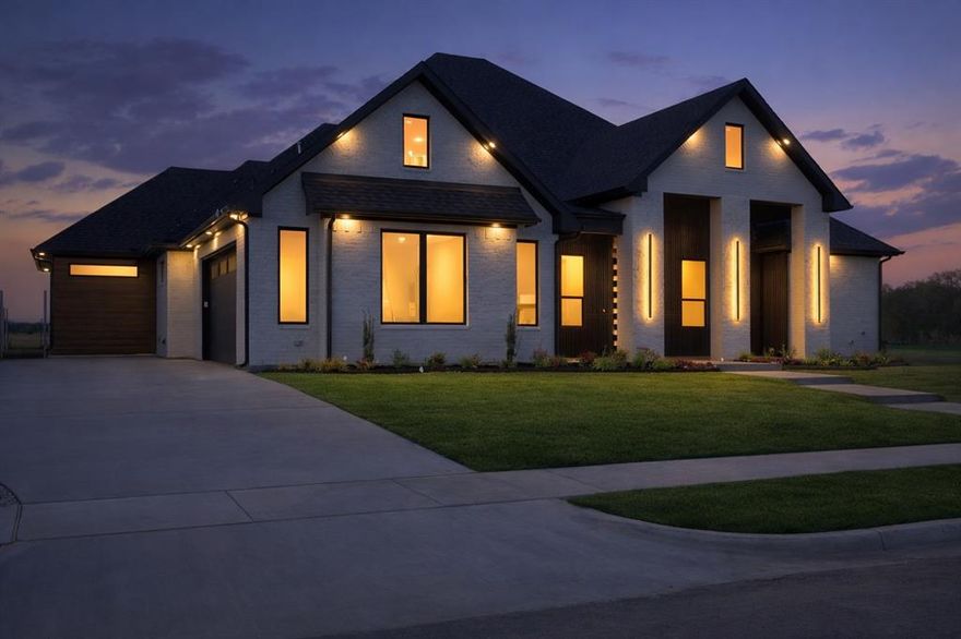 Located in prestigious Fountain Creek Estates, this newly constructed one-story home offers a bright, open layout filled with natural light and thoughtfully selected finishes throughout. Expansive 7-foot windows, 10-foot ceilings with dramatic 14-foot accents, and beautifully trimmed ceilings create a spacious and refined feel from the moment you walk in.

The kitchen and living areas are designed for both everyday living and entertaining, featuring 10-foot custom cabinetry, a gas cooktop, large island, walk-in pantry, built-in dry bar, and a sleek electric fireplace that anchors the main living space. A private office and game room provide flexible areas for work, relaxation, or hosting guests.

The primary suite offers a relaxing retreat with spa-inspired finishes including a separate shower and soaking tub, dual vanities, and a custom primary closet. A spacious utility room connected to the primary closet adds everyday convenience. The home includes 4 bedrooms and 3.5 bathrooms, offering plenty of space for family and visitors.

Beautiful porcelain tile and engineered wood flooring add durability and style throughout the home, while foam spray insulation enhances energy efficiency and year-round comfort.

Step outside to a covered patio and an incredible backyard view overlooking open land for miles, creating a peaceful setting with wide-open Texas skies rarely found in neighborhood living. Combined with a side-entry two-car garage and fresh landscaping, the home delivers strong curb appeal and timeless design.

A standout new construction opportunity in one of Pottsboro’s most desirable communities, just minutes from Lake Texoma, Pottsboro ISD, marinas, dining, and everyday conveniences.