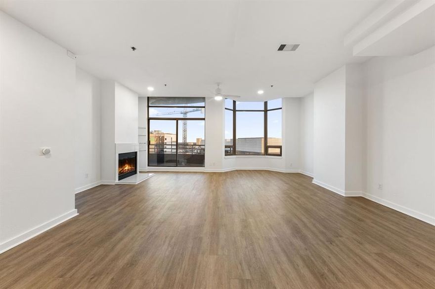 Introducing Unit 22D, a rare top-floor residence with sweeping, unobstructed views of Downtown Dallas. This beautifully updated 2-bed, 2-bath home offers 1,489 sq. ft. of refined living space, elevated by an open layout that welcomes natural light from every angle. Step inside to find fresh modern finishes, including new white-oak–style luxury flooring, crisp interior paint, and a thoughtfully updated kitchen and bathrooms that bring a sense of calm and sophistication.

The spacious living area flows seamlessly onto a private balcony, your front-row seat to the glittering Dallas skyline. Whether it’s morning coffee or evening wind-downs, the backdrop is unmatched. Both bedrooms provide generous space and privacy, making the home ideal for both relaxation and entertaining.

Perched on the top floor, Unit 22D blends style, comfort, and iconic city views into a living experience that stands in a class of its own. Welcome to elevated Uptown Dallas living.