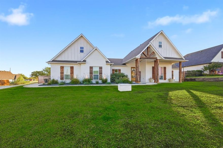 Modern Farmhouse Charm with a Backyard That Feels Like a Vacation! If you’ve been searching for a home that feels like it was designed just for you—5315 Ranya Court might be the one. Tucked into a quiet cul-de-sac on a spacious corner lot, this 4-bedroom, 2.5-bath beauty blends modern farmhouse style with thoughtful design and everyday comfort. Built in 2020 and meticulously maintained, the home welcomes you with ceramic tile flooring, shaker-style cabinetry, and a cozy gas fireplace wrapped in shiplap that instantly makes the living room feel warm and inviting. The kitchen is a true showpiece—subway tile backsplash, stainless steel appliances, granite countertops, and generous prep space that makes even a Tuesday night dinner feel special. The split-bedroom layout gives everyone their own space, with secondary bedrooms tucked away and a primary suite that feels like a retreat. The ensuite bath features a spa-worthy walk-in shower, natural light, and a walk-in closet that’s ready for all your favorite things.
Step outside and you’ll find a professionally landscaped backyard that’s as functional as it is beautiful. The saltwater pool—with auto-fill and drain system—offers low-maintenance luxury and year-round enjoyment. Whether you’re hosting summer BBQs or winding down under the stars, this outdoor space delivers. Other highlights include energy-efficient systems, a two-car garage, and easy access to schools, shopping, and dining. This home checks every box—style, comfort, location, and livability—with nothing left to do but move in and start making memories.