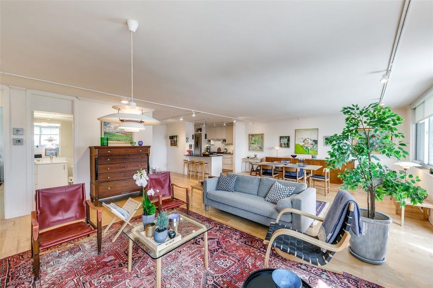 ***Full YouTube Video Walk-through Tour Available***Lovely unit, completely updated in a wonderful mid-century modern building!***Full wood flooring throughout most of the unit, no carpeting anywhere!*** Defined Foyer with room for an entry table.  Beautifully updated Kitchen with Quartz counters, open bar seating, high quality custom cabinetry with adjustable shelving, extensive amount of cabinetry, stainless steel gas range, Bosch Dishwasher, Undermount sink with gooseneck faucet, Leibherr Refrigerator, crisp porcelain backsplash, and undercabinet lighting. Natural light is really excellent throughout the unit, adding to the feeling of openness. The expansive Living and Dining provide flexibility for large pieces and various arrangements. The balcony is large and looks South and West, with vistas across the cityscape, Uptown, and Oaklawn, Kalita Humphrey's Theater, Turtle Creek, it's even possible to just barely make out Cowboy's Stadium in Arlington! Smooth walls and ceilings throughout, with beautiful trim work and hardware. Really large bedrooms with excellent wall space and really large walk-in closets, cleverly done in Elfa by Container Store. In addition, there are three other closets in the unit, also done in Elfa. A great building where you can blend into the walls or be very social. Super walkable location just South of Highland Park. Simply a beautiful and graciously updated condo with a European touch.