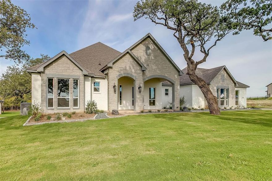 Custom Built Steve Hawkins Home a name that can be trusted for over 40 years. Steve believes in quality of construction that starts with a solid rebar slab foundation with a 10-year warranty. Wood floors through main areas, marble bathrooms, open floor plan, huge lot and surrounded by gorgeous trees! No city taxes, well and septic system - no water bill, and HOA to protect home value!