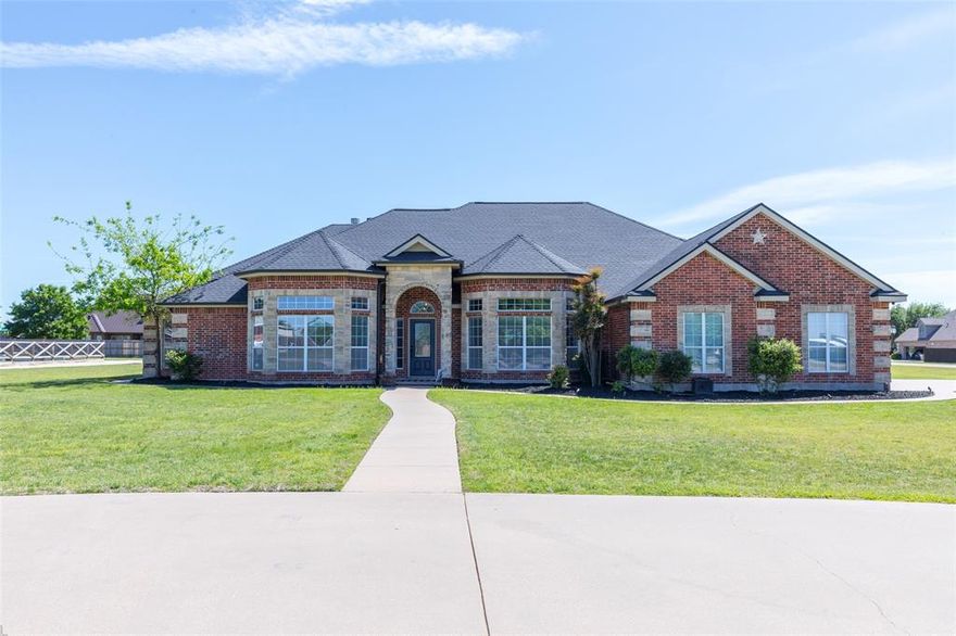 Stunning 4 bedrooms 4 bath home located in desirable Potosi area.  This beautiful property offers the perfect blend of comfort and style, featuring a spacious layout ideal for both everyday living and entertaining.  The heart of the home is the unbelievable kitchen featuring a massive island, granite countertops, eat at bar, lots of cabinets space and walk in pantry. The open concept living area is highlighted by a soaring vaulted ceiling with gorgeous wood beam, fireplace and plenty of natural light creating a warm yet impressive atmosphere.  Second living area or dining.  The 4th bedroom could be used for a study or craft room.  The private primary suite is a true retreat, complete with a spa like bathroom featuring separate vanities, oversized walk in shower, tub and large walk in closet.  The split bedroom arrangement offers plenty of privacy with ensuite bathrooms.   Step outside to your own back yard oasis, complete with a beautiful in ground pool with waterfall and outdoor living space with fireplace perfect for relaxing or entertaining year round. Corner 1 acre lot. Class 4 roof is 2 years old. 3 car garage. Wylie ISD