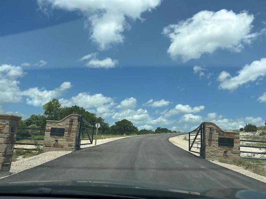 Discover breathtaking Texas Hill Country views with this stunning piece of land located at 2517 Tom Chaney Drive in the prestigious Coyote Ridge community of Hood County. Nestled within a private, gated entrance on a paved road, this parcel offers the perfect blend of open landscape, gentle elevation, and panoramic scenery.
Surrounded by native wildflowers, mature trees, and rolling hills, this lot provides endless opportunities to build your custom dream home in a serene and scenic environment. Whether you're looking to enjoy peaceful country living, stargazing nights, or simply want a spacious retreat away from the city, this property delivers.
Located just off True Grit Way, with easy access to nearby towns and Lake Granbury, it’s ideal for those seeking privacy without sacrificing convenience.