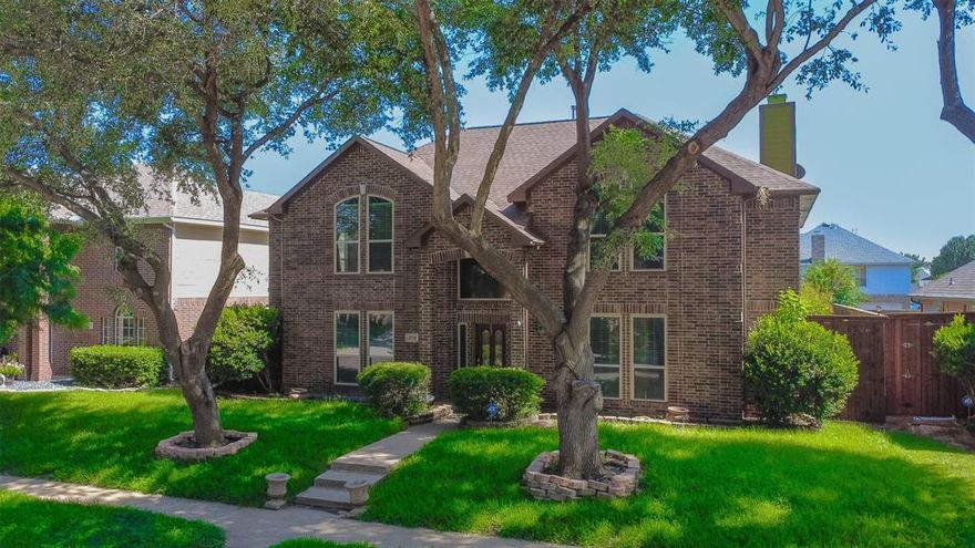 Welcome to this charming two-story home in Grand Prairie, TX. This spacious residence offers a generous layout designed for comfortable living. The first floor features a formal living room and dining room, a family room with a classic brick fireplace, and a kitchen with an island and breakfast nook.
Upstairs, the expansive primary bedroom boasts a walk-in closet and a large en-suite bath, offering a private retreat. Three additional bedrooms and two full bathrooms provide plenty of space for family or guests.
The exterior is equally impressive!! The brick facade and mature trees provide great curb appeal. The backyard is a true oasis, featuring a covered patio and a sparkling swimming pool with a waterfall feature, surrounded by lush landscaping. This home offers a fantastic outdoor space for relaxation and recreation. Don't miss this opportunity to make it your own.!!