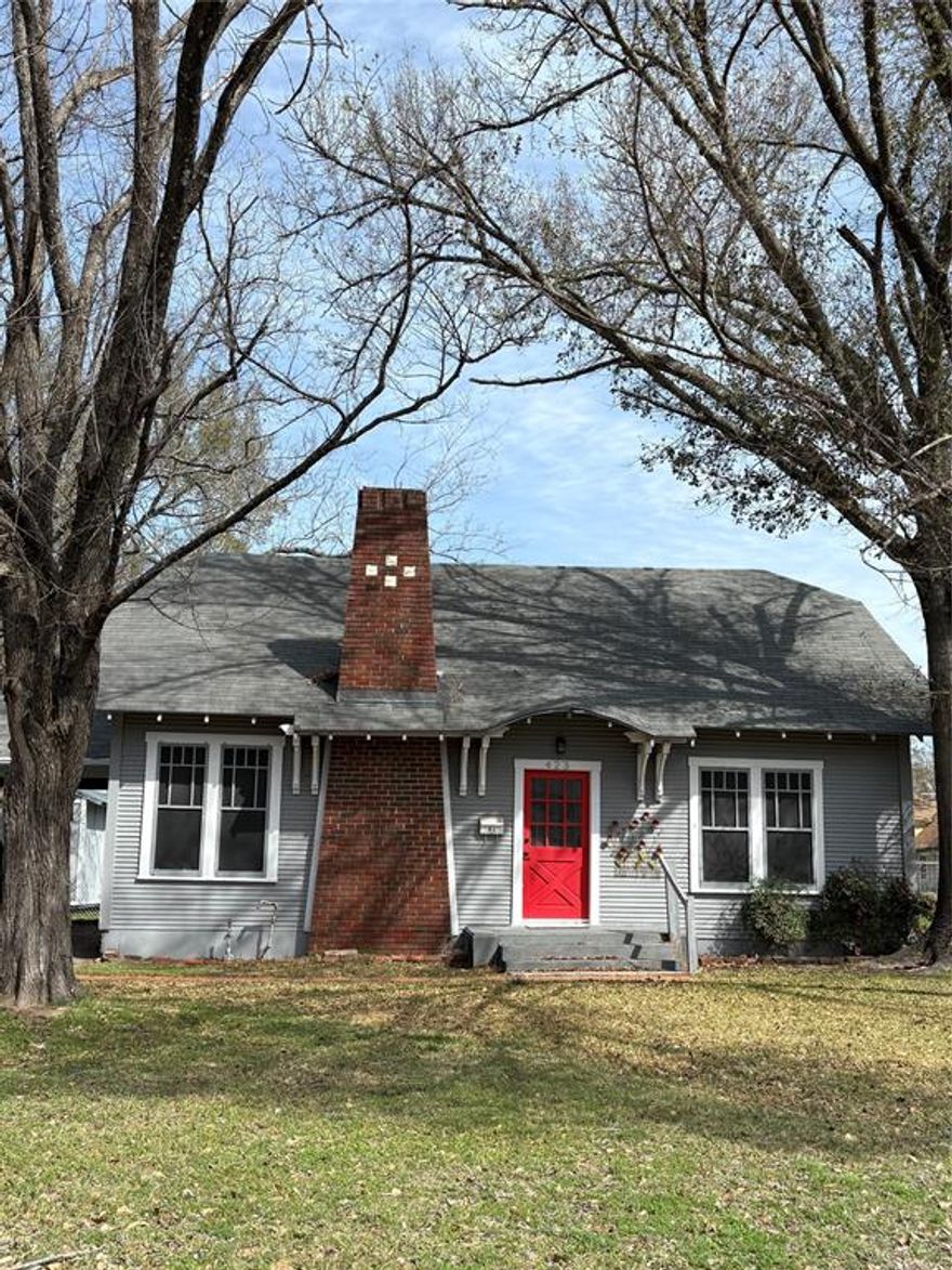 Brimming with vintage charm and thoughtful updates, this beautifully maintained 3-bedroom, 2-bath home offers 1,932 square feet of character and comfort. From the moment you step inside, you’ll notice the ORIGINAL hardwood floors and abundant natural light pouring through the windows; including a stunning stained-glass accent in the kitchen that adds timeless personality. The newly renovated kitchen blends classic style with modern finishes, featuring granite countertops, a marble backsplash, farmhouse sink, and generous prep space, perfect for everyday living or entertaining. Both bathrooms have been tastefully updated, offering a combination tub shower in one and a separate walk-in shower in the other for added convenience. The inviting living room centers around a wood and gas-burning fireplace, creating a warm and cozy focal point. Ceiling fans and blinds throughout enhance comfort and functionality. Step outside to find a true bonus, an air-conditioned she shed complete with laminate flooring and electricity, ideal for a home office, studio, hobby space, or private retreat. The home also includes a water purification system for added peace of mind. This property beautifully balances classic charm with meaningful updates, offering warmth, functionality, and unique character throughout. Close to schools, restaurants and shopping. Schedule your showing today!