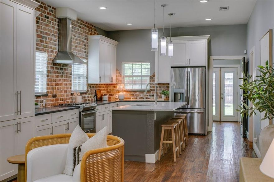 Live life vibrantly in this fully remodeled and move-in ready bungalow located in the heart of Sunset Hills! Thoughtfully reimagined and taken down to the studs in 2018, this home exudes sophistication and true ease of living. Offering an open, breezy layout, ample natural light, and signature finishes like real hardwood floors, beautiful accent beams, and exposed brickwork in the kitchen and dining areas, each space feels intentional and welcoming all in one. At the heart of the home is the expanded eat-in kitchen, featuring an oversized kitchen island with quartz countertop along with ample cabinet and countertop space for all your hosting and storage needs. All three bedrooms are generous in size, with both secondary bedrooms at the front of the home sharing a spacious dual-sink bathroom with separate shower and soaking tub. The primary suite is not to be missed, with a recently remodeled bathroom suite showcasing stunning designer tile in the steam shower and a fabulous walk-in closet. Enjoy long summer nights out on your back porch overlooking the fully fenced in yard or take a quick 7-minute stroll to neighborhood favorite Cenzo’s Pizza and Deli. The possibilities are endless living within the heart of it all in North Oak Cliff. Welcome home!
