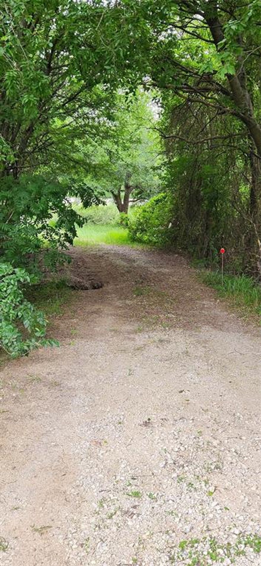 1 acre lot located in rural Gunter.  Feels like being in the country, but conveniences are close, as well as being close to Sherman, Van Alstyne, Celina, Prosper, etc. Just minutes to TX-289(Preston RD). The lot offers a secluded feeling and peaceful surrounding with plenty of trees. There is a small house on the property that will need to be torn down.  It has no value.  There is water and electricity on the property. A great place to build the home of your dreams.