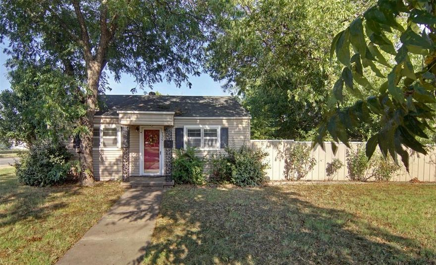 Welcome to this unique property full of character and potential, nestled in the charming College Heights neighborhood and on 2 lots with 5 mature pecan trees! This home features 2 bedrooms, 2 bathrooms, and a flex room—ideal as a second living area, or third bedroom—along with a bonus room just off the main hallway, perfect for a home office, craft room, or quiet reading nook. The inviting wood-burning fireplace adds warmth and charm, and even includes discreet built-in storage for your firewood, keeping your space clean and cozy. You'll love the abundant storage throughout the home, and for added peace of mind, there's a storm cellar on-site as well. Outside, enjoy a fully fenced backyard that’s perfect for pets, kids, or relaxing evenings under the stars. Located just minutes from downtown Graham, you’ll have easy access to shops, dining, and community events, all while enjoying the peaceful feel of a quiet neighborhood. Whether you're a first-time buyer, investor, or someone looking to add their personal touch, this property is a fantastic opportunity.