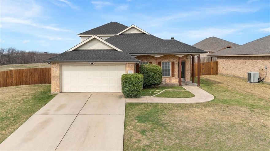 ALL BEDROOMS DOWNSTAIRS + HUGE GAME ROOM! Hard-to-find floor plan in the desirable Lake Ridge Estates community in Sanger ISD. This spacious 4-bedroom, 2-bath home sits on an oversized corner lot and offers a layout buyers love.
The inviting living room features a cozy wood-burning fireplace and abundant natural light, flowing into the open kitchen and dining area—perfect for everyday living and entertaining. The kitchen offers stainless steel appliances, generous counter space, a large walk-in pantry, and bar seating ideal for casual dining or hosting guests.The private primary suite is located on the main level and includes a double vanity, relaxing garden tub, separate shower, and a spacious walk-in closet.Upstairs you’ll find a large game room-flex space with walk-in attic access—perfect for a media room, playroom, home office, or second living area.Enjoy the covered back patio overlooking the oversized backyard with plenty of room for entertaining, pets, or even a future pool.Additional highlights include a sprinkler system, two-car garage, and convenient access to schools, shopping, and I-35 for commuting.
Homes with this layout rarely come available—schedule your showing today!