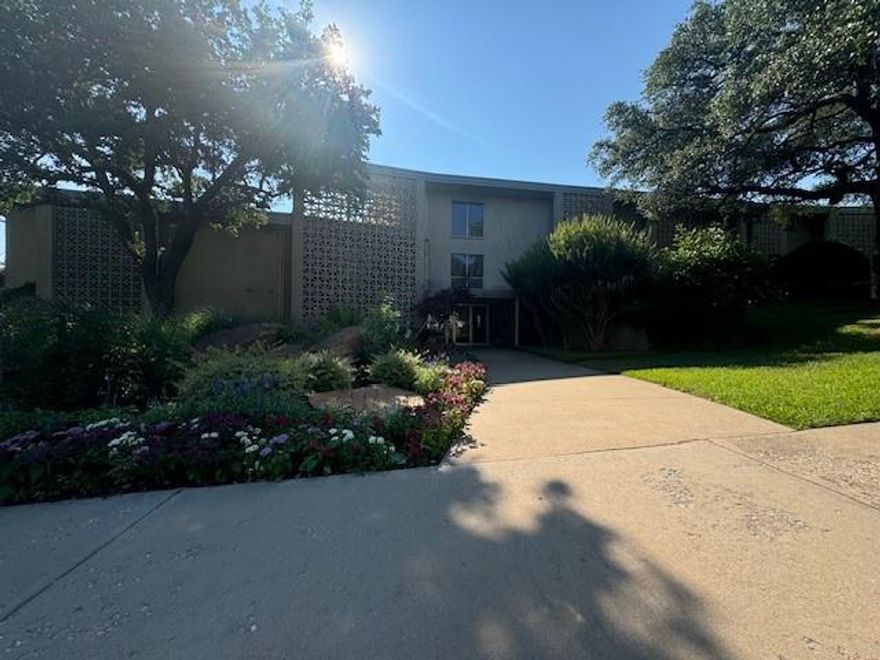 Palm Springs meets Fort Worth! Step inside this luxurious 2 bedroom 2 bath condo in one of Fort Worth's most exclusive and historic buildings. No detail was missed in this remodel leaving gorgeous floors, tile, designer fixtures and fun color throughout. Expansive windows that bring in ample natural light and connect the indoor and outdoor spaces. Spacious bedrooms including walk in closets, sleek and sophisticated bathrooms, and an additional private balcony off secondary bedroom. Unwind at the end of the day on the expansive patio overlooking the sparkling pool or entertain friends in the sophisticated kitchen and dining area. HVAC replaced in past few years. Peaceful and quiet Ridgmar location close to many conveniences, shopping, and dining, including Camp Bowie Blvd, just minutes to Central Market and Fort Worth's Cultural District.