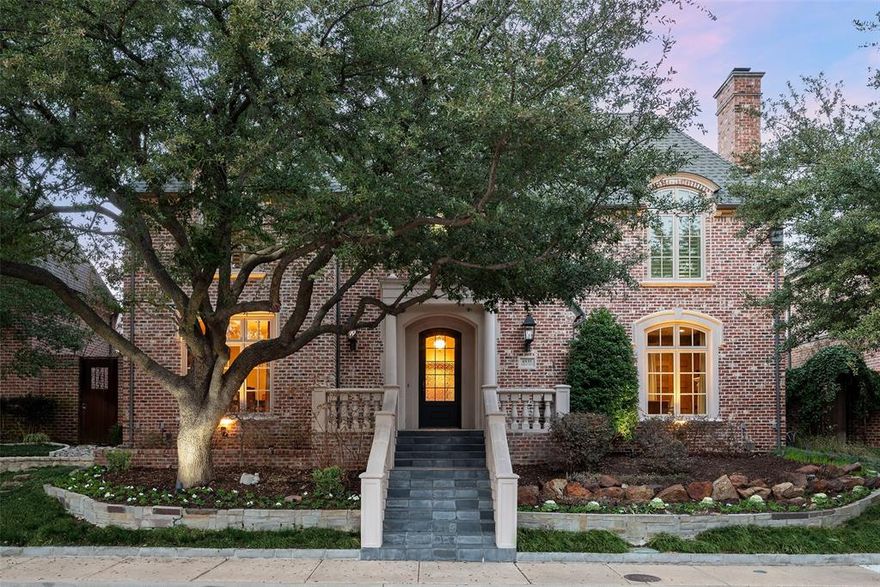 Beautiful Gage home on prestigious 'model row' in highly sought guarded and gated Lake Forest. Timeless elegance and well designed four bedroom home plus study with open living-kitchen-dining layout. Step into the gracious entry flanked by a generous sized formal dining room and library with a fireplace and built-in shelving, which could also serve as a formal living area. The chef's island kitchen features stainless steel appliances, gas range, double ovens, granite counter tops, butler's pantry, walk-in pantry and breakfast area open to the family room. The family room features a stone fireplace and wall of glass and French doors opening to a covered patio and pool-sized turfed yard. The private primary suite has separate his and her bathrooms and dual walk-in closets. Three secondary bedrooms are located upstairs, one of which could be utilized as a game-media room if desired. Other amenities include stacked closets for future elevator, hardwood flooring, plantation shutters, and professional landscaping with a wide variety of colorful perennials. Conveniently located within close proximity to Dallas' best shopping, dining and private school corridor! Lake Forest is comprised of 170 acres of park-like grounds with green spaces, lakes, and towering oaks. Residents enjoy walking trails, community pool, tennis & pickle ball courts, and dog parks.