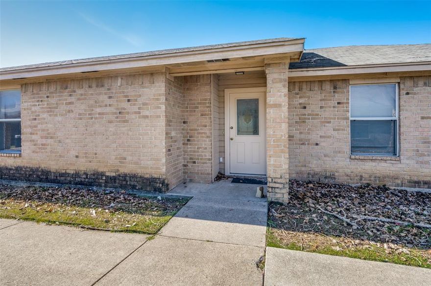 Half duplex located just North of Fort Worth right off of highway 820. Offers a spacious 2 bedroom, 2 full bathroom. Ceramic tile floors and bedroom carpets throughout. Kitchen comes equipped with a refrigerator, dishwasher, and electric oven. Also features a covered carport parking space. Will not last long! Schedule your showing today!