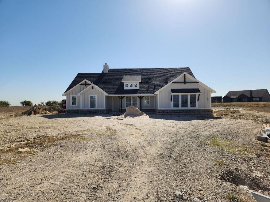 Estimated December completion! Ask us about our Trade In Trade Up program, we can buy your home! The 4-bedroom Colorado 2 offers a thoughtful 2,426 sq. ft. layout. From the entrance, you see the entire main living area, an open concept perfect for entertaining. The kitchen features a large center island with seating for four and a view of the family room fireplace. A formal dining room near the kitchen is ideal for special occasions or can be a playroom or living room. Across the foyer, a flex room can become a fifth bedroom. The owner's suite, located at the back under a tray ceiling, includes a bathroom with a soaking tub, step-in shower, dual vanities, and a private water closet, plus a spacious walk-in closet with wooden shelves. The three secondary bedrooms, two with walk-in closets, are in a suite-like area and share a second full bath. The Colorado 2 strikes a perfect balance between togetherness and privacy. This home will be zoned for Dixie Hansel Elementary which is currently under construction.