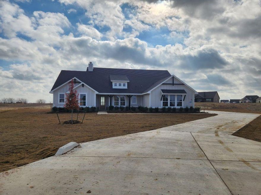 Estimated December completion! Ask us about our Trade In Trade Up program, we can buy your home! The 4-bedroom Colorado 2 offers a thoughtful 2,426 sq. ft. layout. From the entrance, you see the entire main living area, an open concept perfect for entertaining. The kitchen features a large center island with seating for four and a view of the family room fireplace. A formal dining room near the kitchen is ideal for special occasions or can be a playroom or living room. Across the foyer, a flex room can become a fifth bedroom. The owner's suite, located at the back under a tray ceiling, includes a bathroom with a soaking tub, step-in shower, dual vanities, and a private water closet, plus a spacious walk-in closet with wooden shelves. The three secondary bedrooms, two with walk-in closets, are in a suite-like area and share a second full bath. The Colorado 2 strikes a perfect balance between togetherness and privacy. This home will be zoned for Dixie Hansel Elementary which is currently under construction.