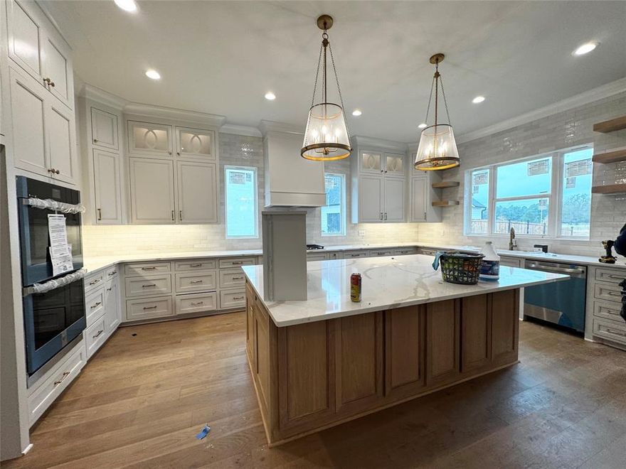 A new home just in time for Christmas! Luxury new construction home in The Grove at Garrett Farm. One-of-a-kind, waterfront lot. The views are incredible. Estimated completion is end of November 2025. Excellent floor plan. Great flow between Living, Dining and Kitchen. Chef's Kitchen features an oversized island, gas cooktop, to-the-ceiling cabinetry and floating shelves. Great windows and natural light throughout. Four bedrooms (3 down, 1 up) plus a downstairs office or playroom. Oversized, secluded Master Suite. Powder Room. Massive back porch with outdoor Kitchen. 3-Car Garage. Schedule a private tour today. Located in The Grove at Garrett Farm, residents enjoy a wonderful lifestyle on 78 peaceful acres along Wallace Lake Road in South Shreveport. This gated community is designed for healthy, connected living, offering walking trails, green spaces, scenic lake views, and more. Don’t miss your chance to own this timeless home in one of Shreveport’s premier communities.