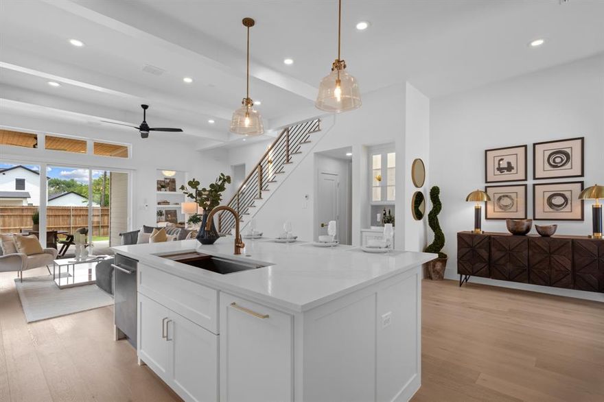 Walkable Downtown Luxury! This exquisite custom home sits just one block from the vibrant heart of historic Downtown Roanoke...walk to restaurants, shopping, and entertainment. Completed in 2024, this designer crafted residence blends modern design with timeless craftsmanship. 
Inside you’ll find a bright, open concept floor plan showcased by wide plank white oak floors, custom millwork, and designer lighting throughout.  The spacious dining room is framed by striking overhead wood beams. The chefs kitchen is a showpiece with  top-tier appliances, custom cabinetry,  built-in refrigerator, oversized island ideal for gatherings. The large walk in pantry and butler’s pantry provide excellent storage, prep, prep, and small-appliance space. The inviting living area features a beamed ceiling and cozy fireplace, blending comfort with style. The primary suite is a true sanctuary, complete with an expressively sized walk in closet.  The spa level bathroom featuring dual showers, overhead rain showers,  soaking tub,  drip-dry zone and floating dual vanity with double sinks. Upstairs, three spacious bedrooms and two full baths and  game room adds versatility for recreation or downtime. Outside, a covered back patio invites year-round entertaining. You will be impressed with the garage!  Organizational system and work bench recently installed and will all stay  Thoughtfully designed, energy-efficient, and luxuriously appointed. This home presents the perfect marriage of modern living and timeless elegance in one of Roanokes most coveted settings. This is a MUST SEE!