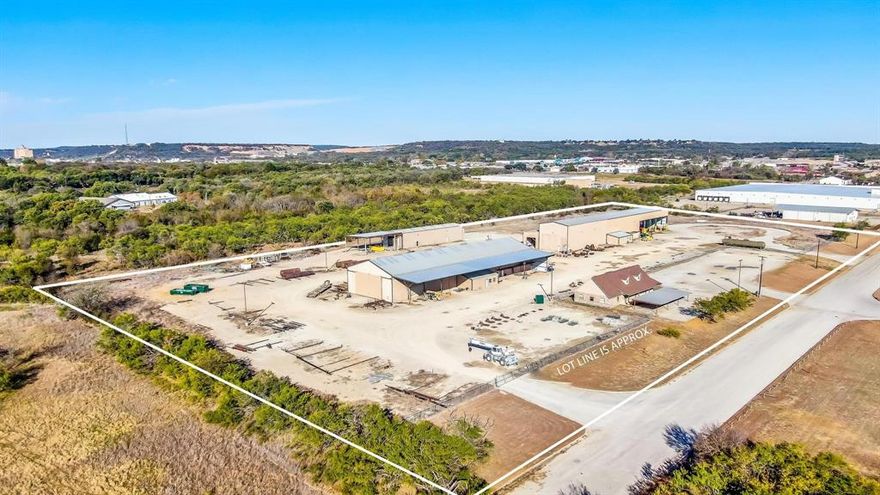 LEASED FABRICATION FACILITY IN MINERAL WELLS TEXAS.  EXCELLENT PASSIVE INVESTMENT WITH TREMENDOUS UPSIDE. 11.85 ACRES ON DEAD END CONCRETE ROAD SURROUNDED BY OTHER BIG COMMERCIAL OUTFITS.  BIG SHOPS WITH LOTS OF POWER!!!!! OWNER FINANCING AVAILABLE.