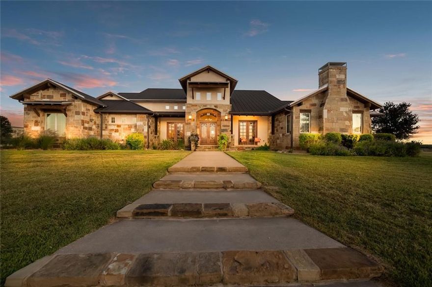 Bring your horses, family and friends and start enjoying this spectacular luxury ranchette in the heart of Central Texas sitting on approximately 34 rolling acres with a gorgeous home, pool, brand new guest house, rodeo arena and much much more — within Lorena ISD!  The almost 4,000 square foot main residence is grand yet unassuming, allowing it to commune with the landscaping and compliment the spectacular sunsets. Stucco, hill country rock and a metal roof compliment the exterior architecture and instantly makes the interior of the home become a ‘must-see’.  Walk-up the grand entry and in through the massive iron double doors that leads you to a breathtaking formal dining room and executive office. Both with mirrored double doors and a bonus butler's pantry. From there you can enjoy views of the kitchen, living, and dining with custom detailing throughout each space from vaulted ceilings to a decked out kitchen with a double oven. Other interior features include 4 spacious bedrooms, 3 full baths,  a huge game room with an attached half bath, a secluded master suite with a bonus workout room, and lastly an enormous screened in porch right off the game room that can entertain the masses. The exterior features of the home include a large diving pool, a detached cabana with a half bath and covered spa, a vintage silo pavilion and all surrounded by a uniquely designed turf lawn with a fun putting green feature.  Less than a hundred yards away from the house you will find a STUNNINGLY executed guest house implemented into the 100’ x 75’ metal workshop that includes 3 bedrooms, 2 full bathrooms, an open-concept kitchen/living/dining and a huge walk-in laundry room.  This space would also make a highly-sought-after and lucrative AirBNB.  You will also find another great office space within the workshop as well as a huge 920 square foot storage space and a transition to the 100’ x 60’ covered horse pens on the exterior.  Each pen is equipped with a horse run and another co