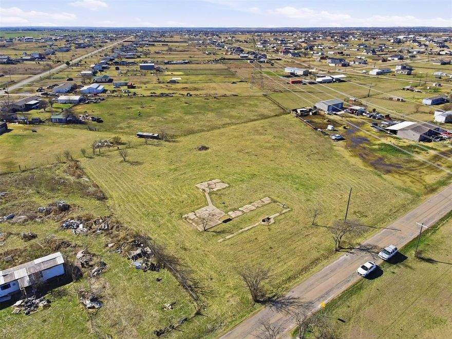 Residential property opportunity on 2.21 sprawling acres perfect for building your dream home or enjoying peaceful country living. This property combines tranquil rural space with convenient access to nearby cities. Situated just west of the heart of Joshua, the home is approximately 22 miles south of Fort Worth, making it an easy 20–25 minute drive into the heart of one of North Texas’ major metropolitan centers — ideal for commuters or anyone who loves the balance of quiet living with city convenience. In addition, the property offers great access to Cleburne, providing additional shopping, dining, entertainment, and services close by.