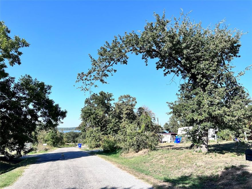 This is your chance to own ready-to-go RV sites near Lake Texoma. The five lots have water, electric, and septic hookups for four RVs. Two spaces are currently rented month-to-month with a written agreement. The property is close to Sherwood Shores Park on Texoma, as well as three marinas and Juniper Point Park. You could also turn the property into a single-family homesite. So come on, use your imagination and create your own Lake Texoma home or rental property!