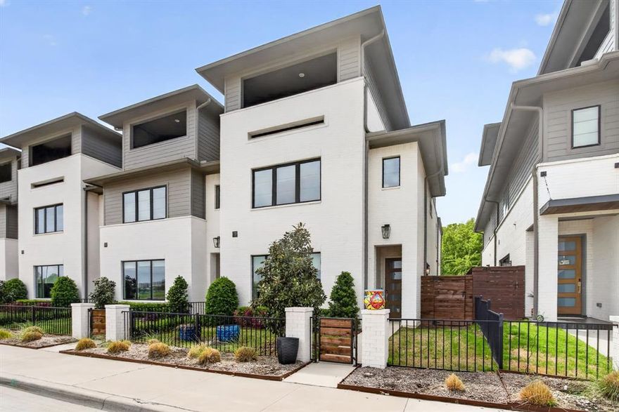 Rare opportunity to own a luxury townhome overlooking the Trinity River. This one-of-a-kind residence is beautifully appointed with designer finishes throughout, and includes a private elevator for added convenience. As you enter, a custom velvet-tufted banquette makes a statement anchoring the space as it opens to the kitchen and living room. The kitchen features ample cabinet and storage space, an oversized island, and beautiful quartz countertops. Additionally, you will notice elevated window treatments and curated light fixtures that carry throughout the home, adding a polished finish to every space. Featuring three bedrooms, two full bathrooms, and two half-baths, the thoughtfully designed layout provides effortless living on every level. The primary wing offers a luxurious retreat with dual walk-in closets and an oversized bath featuring a soaking tub and separate shower. The third floor boasts a spacious second living area, a half bath, and an oversized covered patio with scenic views overlooking the trails. Step right outside your front door to enjoy miles of walking and biking paths along the Trinity River. As an end unit, this townhome offers additional outdoor space, enhanced privacy compared to other units, and radiant natural light. The HOA covers lawn care, sprinkler system, insurance of the common areas and exterior residences, and roof. Ideally located within walking distance to Waterside’s premiere dining, fitness, and shopping including Whole Foods, Piatello, and other sought-after destinations.
