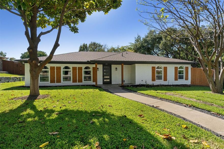 Modern Luxury Meets Classic Charm – Now Available for Lease in the Heart of Rockwall! Be the first tenant to enjoy this beautifully renovated home just minutes from Lake Ray Hubbard! Offering a seamless blend of modern design and timeless comfort, this fully updated 5-bedroom, 3-bath home feels like new construction with the convenience of an established neighborhood. Step inside to an open-concept layout featuring luxury vinyl plank flooring, fresh interior paint, and new energy-efficient windows that bring in exceptional natural light. The chef’s kitchen boasts quartz countertops, custom cabinetry, stainless steel appliances, and an oversized island ideal for meal prep, casual dining, or entertaining. The spacious primary suite provides a retreat-like feel with a spa-style ensuite complete with frameless glass shower and dual vanities. Secondary bedrooms are generously sized and baths have been stylishly updated. Enjoy flexible living with multiple oversized rooms, ideal for remote work, multigenerational living, or a guest suite. Outside, the large backyard and extended deck offer room to relax or entertain. The oversized 2-car garage plus extended carport provides extra parking or space for a boat or lake toys — perfect for lake living! Conveniently located near The Harbor, historic Downtown Rockwall, lakefront parks and marinas, shopping, dining, top-rated schools, and major highways. Experience luxury leasing with a like-new remodel in a highly sought-after community.