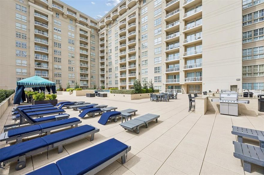 Iconic Turtle Creek hi-rise at the intersection of vibrancy and convenience. Stylishly refreshed condo with new flooring, fixtures, lighting along with fresh paint and a new full sized washer-dryer and water heater! Perfectly positioned with quick access to UT Southwestern, SMU and downtown Dallas. Inside, the open layout creates an easy flow between kitchen, dining, and living spaces - ideal for entertaining and unwinding. The kitchen features sleek stainless appliances, granite countertops, a pantry and a large breakfast bar. Full sized utility room provides extra storage! The living area opens to a large balcony with stunning downtown and sunset views ideal for morning coffee or evening wind-downs. The spacious primary suite offers a quiet retreat with an expansive walk-in closet and direct bath access. Life here extends well beyond your front door. Residents enjoy 24-hour concierge and valet service, resort-style pools with cabanas, a spa and sauna, grilling areas, two fitness centers, business centers, guest suites, and secure gated parking. Just outside, the Katy Trail and Turtle Creek Park invite you outdoors, while Uptown, Oak Lawn, West Village, and the urban pulse of Downtown are moments away. This is lock-and-leave living with high-rise sophistication - designed for those who want to stay connected to the academic, medical, and cultural heartbeat of Dallas while enjoying an elevated, amenity-rich lifestyle.