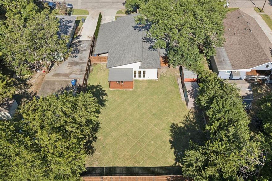 Fantastic opportunity! Newer home minutes from the incredible Historic Downtown McKinney! Completed in 2023, this impressive home boasts striking curb appeal with modern paint colors, covered front porch, two private back porches, a HUGE fenced pool sized backyard and all the benefits of living close to Downtown McKinney without all the historic district restrictions! Step up to the modern split light front door and enjoy the charming front porch- perfect for chatting with neighbors or just enjoying the outdoors. Step inside and be ready to be impressed! This light and bright open floorplan boasts 9 foot ceilings vaulted to 14 feet in the living room, fantastic flow and abundant natural light from multiple windows. Features of the home include easy care LVP flooring throughout (except baths), modern ceiling fans with remote control in most rooms and quartz in kitchen and baths. The spacious living room is open to the kitchen and dining making it perfect for entertaining. The kitchen is a dream with quartz countertops, massive island, enormous walk in pantry and stacked cabinets with glass to showcase your treasures with soft close cabinetry. Just off the living room is a private office, perfect  for dedicated  work from home space but not too far from family activity. The spacious primary has backyard access, spa like en suite bath and massive walk in closet. The split secondary bedrooms are also nice sized! The home has a huge fenced backyard that is perfect for pets and kids to run and play. Two sheds for great storage. Note from seller: the roof was designed for possible future solar panels with large area facing south.  Convenient to all that Historic Downtown McKinney has to offer including shopping and dining, this location can't be beat. Don't miss this one! Please note that this is an active AIRBNB. Do not approach property with out an approved appointment.