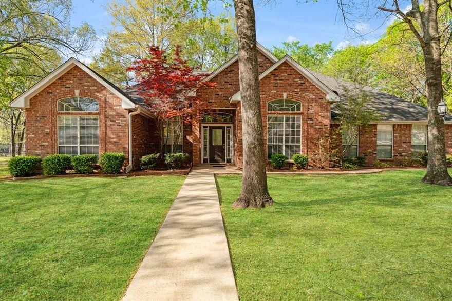 Welcome to this beautiful home nestled in the desirable Beaver Creek neighborhood in Powderly, Texas. This inviting property offers 3 spacious bedrooms and 2 full bathrooms, each featuring walk-in closets for ample storage.
The heart of the home is the stunning kitchen, complete with a large island, abundant counter space, built-in appliances, and a cozy breakfast nook—and a formal dining area perfect for morning coffee or casual dining. Vaulted ceilings add an airy, open feel, while the living room features a charming real wood-burning fireplace, creating a warm and welcoming atmosphere.
Step outside and enjoy all that this property has to offer. Situated on 0.653 acres, the fully fenced yard provides privacy and space to roam. Relax on the covered back porch overlooking peaceful wooded surroundings, with mature trees offering shade and serenity. A sprinkler system helps keep the landscape looking its best year-round. As well as a two car garage. This home blends comfort, functionality, and natural beauty—ready for you to make it your own.