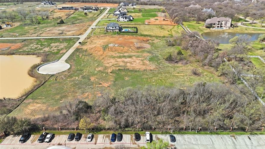 Build your dream home on this exceptional 2-acre homesite in the sought-after Hudson Hills community of Bartonville. Tucked away on an elevated interior cul-de-sac lot, this property offers the ideal setting for a stunning custom estate with beautiful views and added privacy. Bring your own builder and create a home tailored to your lifestyle in one of North DFW’s premier luxury developments. Hudson Hills features impressive custom homes by some of the area’s top luxury builders, combining refined living with a prime Bartonville location. Enjoy the convenience of being within walking distance to the popular Marty B’s entertainment district while still enjoying the peace and exclusivity of this private homesite. For all the golf and country club enthusiast, this property is 5 minutes from Lantana Golf Club and 10 minutes from Denton Country Club. Enjoy all the space and tranquility that comes with country living while remaining just minutes from restaurants, shopping, and entertainment.