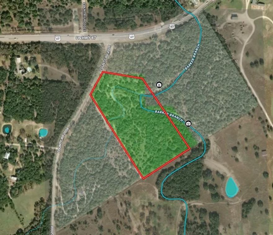 Beautiful cedar and hardwood treed property with a great view to the southeast.  A seasonal creek runs through the property and you get the feeling of seclusion, but you are just 5 miles from Glen Rose.  The County water is located at the property line.  A new gate and access road from CR 2008 will have to be made. Power runs through the center of the property, lots of wild game including deer on the property with huge oak trees for your deer blind.  A majority of the property will have to be accessed via UTV or walked. Call for an appointment today, Listing agent will meet to tour the property.