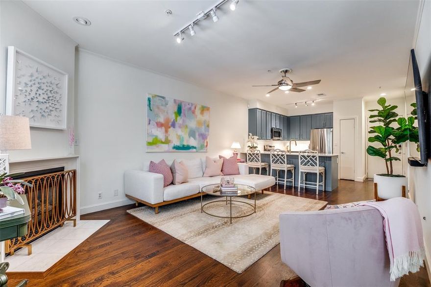 BEST AND FINAL OFFERS DUE BY 5PM ON APRIL 1st!!! Step inside this stunningly updated, RARE street-facing 3 bed, 2 bath condo in the heart of Oak Lawn. Light-filled and thoughtfully designed, the open-concept layout features a completely renovated kitchen with bar seating, perfect for everyday living and entertaining. Stunning wood floors run throughout the downstairs, and a cozy fireplace anchors the living room, adding warmth and charm. The functional floor plan offers two bedrooms and a full bath downstairs, while the private upstairs primary suite provides a quiet retreat. A charming Juliette balcony overlooks the peaceful, tree-lined street. Recent updates include but are not limited to HVAC (2022), fully remodeled kitchen and bathrooms, fresh interior paint, and new carpet, making this home truly move-in ready. Walk out the back door and enjoy the sparkling pool, hot tub, and grill. Two assigned garage spaces. HOA includes water, sewer, and gas. Prime Dallas location near Turtle Creek, Katy Trail, and Oak Lawn’s best dining and entertainment.