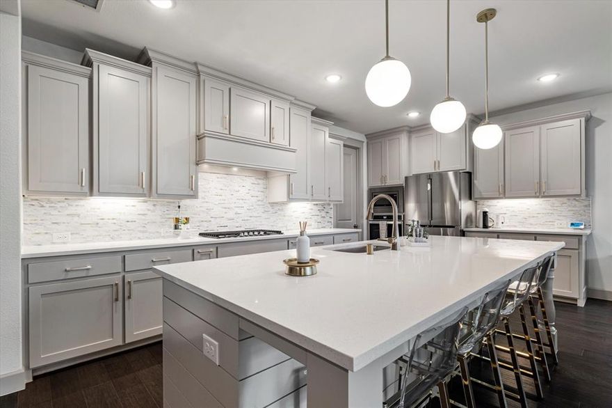 Is there a 5-bed single family home in Frisco under $1.2M with luxury features, Frisco ISD schools, and space to host? Yes, PRICE IMPROVEMENT. With 5 bedrooms (including 2 on the main level), 5.5 baths, a private office, media room, and game room, this 4,431 sq ft residence offers standout value in the Estates at Shaddock Park. Built in 2020 and priced below neighborhood comps, this move-in ready home is loaded with extras: soaring ceilings, open layout, abundant natural light, and a chef's kitchen with quartz counters, walk-in pantry, and oversized island. The primary suite features a luxe bath and custom closet system. Upstairs, enjoy movie nights in a fully furnished media room (recliners, 85in TV, electronics, popcorn machine stay) and a game room complete with pool table and seating. Additional highlights include: epoxy-finished 3-car garage, covered patio, Smart Home tech, full-size laundry with washer and dryer included, and flexible closing.
Located in top-rated Frisco ISD near parks, trails, shopping, and dining. HOA with access to pool, playground, and greenbelt.
Don’t miss this price-improved opportunity for space, style, and smart value in Frisco. Schedule your private tour with Tenesha Lusk, Keller Williams DPR.