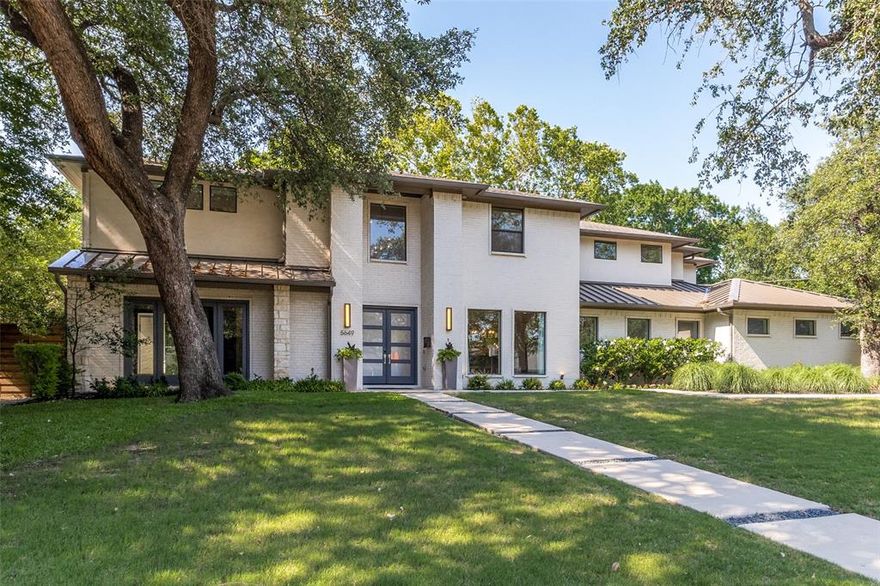 Experience opulent living in this custom Melshire Estates residence, set on nearly half an acre of lush greenery. The first floor boasts a seamless open layout, blending an owner's suite, a cozy guest bedroom, and a chef's kitchen with top-notch appliances and updated cabinetry, hardware. Upstairs, three lavish suites await, each with private baths and walk-in closets. Entertainment options abound, courtesy of a Plank and Hide Co pool table, a State-of-the-Art HD Golf Simulator in the media room, and multiple flat-screen TVs thoughtfully left by the owner. Step outside to the patio oasis, complete with a built-in grill and fireplace, perfectly complementing the tranquil pool and fire pit. The house is equipped with a Kinetico Water purifying system ensuring pristine water. Recent updates including fresh paint, landscaping, lights and fixtures, this home embodies luxury living. Conveniently situated near Dallas' premier private schools, dining, and shopping destinations.