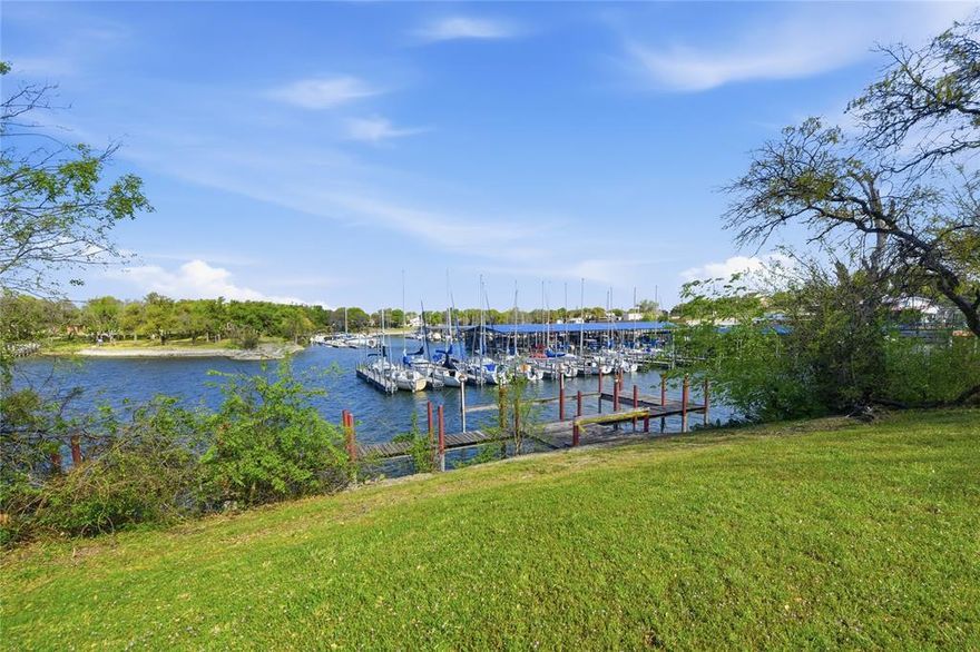 An exceptional opportunity to secure a premier waterfront homesite in the prestigious Cape Royale community on the highly desirable east side of Eagle Mountain Lake. Lots of this caliber are rarely available, making 9144 Timber Oaks a true standout for buyers seeking an elevated lakefront lifestyle.  Tucked away on a quiet cul de sac and surrounded by beautifully established residences, this approximately quarter acre lot offers an ideal canvas for a custom luxury retreat or an elegant full time residence. The setting captures picturesque views of sailboats and recreational vessels as they glide in and out of the nearby marina, creating a dynamic and ever changing waterfront backdrop.  The property includes the valuable steel structure of an existing dock with slip already in place, providing a significant advantage for future enhancements and immediate lake enjoyment once board repairs are completed.  With convenient access from Boat Club Road, the location offers seamless connectivity to Fort Worth while preserving the serenity and exclusivity that define refined lakeside living. Opportunities to build new on the east side of Eagle Mountain Lake are limited, especially within a well established neighborhood known for quality homes and pride of ownership.  Design and build the luxury lake home you have always envisioned. Contact us today to explore this rare offering and begin your journey to sophisticated waterfront living.