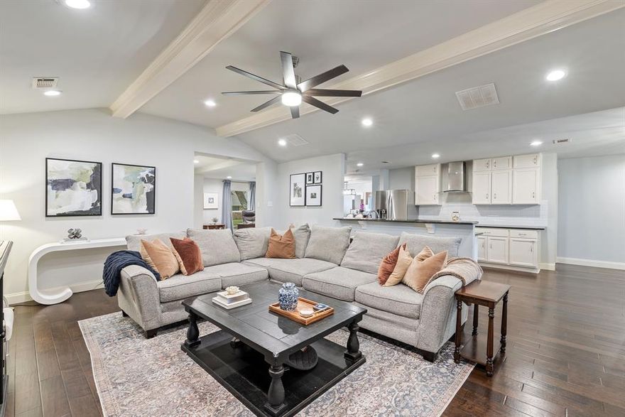 Sophisticated. Comfortable. Functional. This beautifully designed home blends timeless style with everyday livability. A lush, fully landscaped yard welcomes you with stunning curb appeal. Inside, you’ll find uniform flooring throughout the common areas and a soft, light color palette that enhances the airy, open feel. The bright kitchen with a cozy breakfast nook seamlessly opens to the living room, where a vaulted ceiling, fireplace, and backyard views create the perfect gathering space. The formal dining room offers plenty of room for hosting family and friends. The spacious primary suite features dual sinks, a walk-in shower, jetted tub, large walk-in closet, and private water closet. Two additional bedrooms share a beautifully updated bathroom, while the fourth bedroom with its own ensuite bath, and location on the opposite side of the home, makes an ideal guest or MIL suite. Step outside to a backyard built for entertaining — complete with a covered patio, pergola, Trex decking, putting green, and lush grass space. Additional highlights include a full-size laundry room, two-car garage, and zoning for highly rated Bowie Elementary and JJ Pearce High School. This home truly offers the perfect balance of refined elegance and everyday comfort.