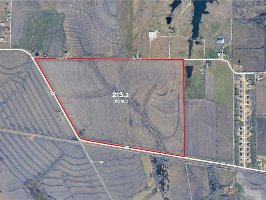 Prime development land, most suitable for high density residential use.  This 213.2± acre property has thousands of feet of road frontage along both FM 879 and Wilson Rd.  This site is conveniently located about two miles from HWY 287, east of Waxahachie.  Part of the property is in the City of Waxahachie, and parts are in the County.  A 12 inch water line exists along the northern boundary of the property and a City sewer line is about a mile to the West.  Electricity is available on-site.  Do your own homework regarding available utility capacity for your intended use.