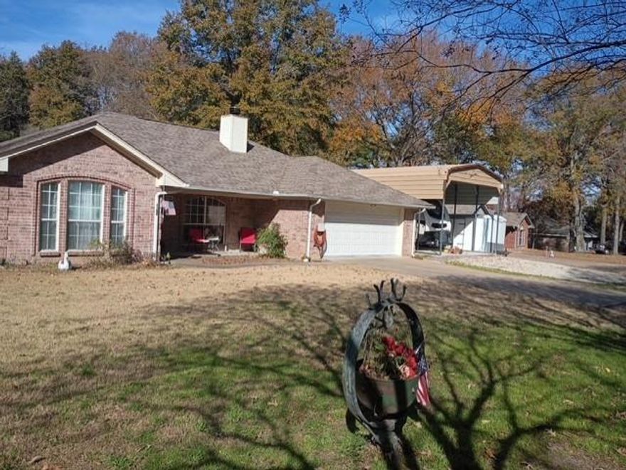 Beautiful home in a quiet neighborhood, Open floor plan, pan ceilings, with ceilings fans throughout the home. Cozy Fireplace in the Livingroom for the cool winter nights, screened in back porch for enjoying the evenings in the Spring, a well-designed kitchen with lots of extra touches for cooking those family meals. 3 spacious bedrooms with walk-in closets, sitting area in the primary bedroom, full size shower in the bath, plus plenty of cabinet space. Two additional bedrooms and full bath on the opposite end of the house plus a 2-car attached garage with heat and ac. Outside there is so much more, large, insulated shop building with, two overhead doors with openers, walk through side door and room for your cars, truck, boat, plus a workshop with room for tools or hobbies. And for those who have an RV, the RV Port with full hook-ups make being ready for travel a snap. Private well furnishes water for the time activated yard sprinkler system. Just minutes from Mineola, Lake Fork, schools, shopping and so much more. You need to see this to really appreciate it. Call and set up your viewing.