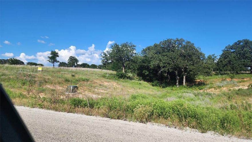 MOTIVATED SELLERS!  Beautiful upcoming subdivision of The Ranches of Valley View East, located just 5 miles west of Springtown. Lot 63 is 1.887 acres looking out across the landscape from atop of a hill with beautiful views for miles.  It is abundant with trees and has a seasonal creek running through the back. Gorgeous building sites! Choose to build back in the trees and be secluded from the road or build closer to the front and have your own private get away in the back!  Drive out and take a look today!