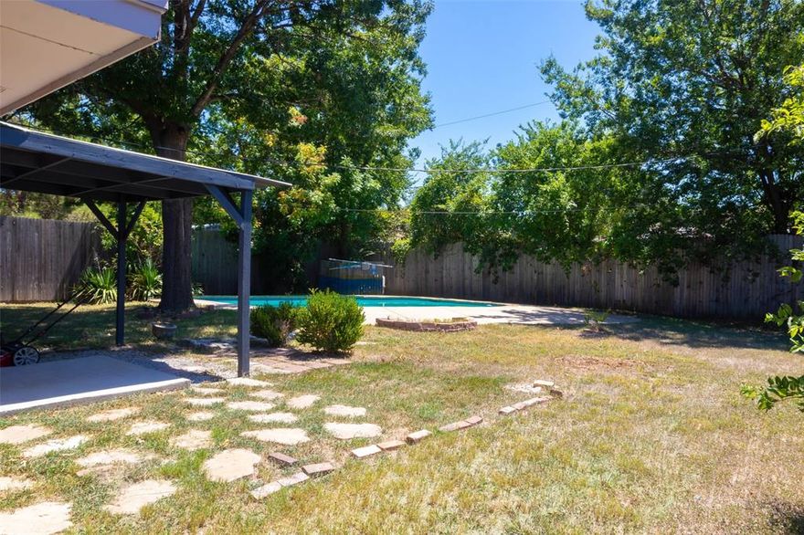 Welcome to this beautifully maintained home tucked away in a quiet, established neighborhood. Thoughtfully designed for both comfort and entertaining, the open floor plan centers around a stunning brick fireplace that anchors the living space with warmth and character. Just off the dining area, a versatile flex room offers endless possibilities as a second living area, home office, or creative studio. One of the spacious bedrooms is a well-designed garage conversion, offering extra living space with its own unique charm and functionality. Each bedroom includes a walk-in closet, providing ample storage and personal space. Step outside to your private backyard retreat, featuring an oversized lot and a pool that's ideal for relaxing or hosting gatherings. Experience the perfect blend of comfort, character, and versatility.