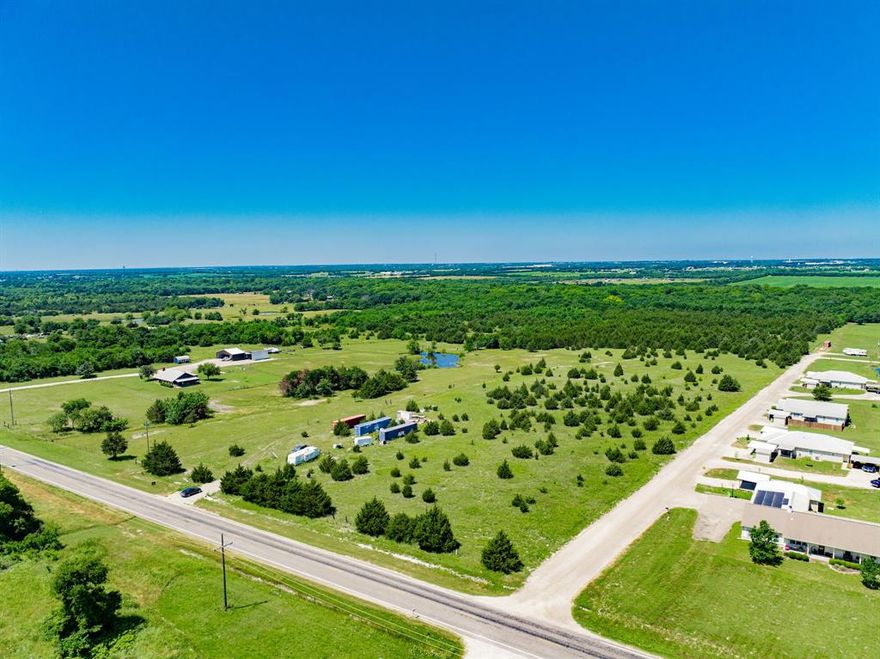 Welcome to Caddo Creek Estates! Here is approximately 11.375 acres of prime real estate for your home here in Farmersville (Merit). Come build your dream home with supreme privacy and absolute majestic beauty that North Texas has to offer! Electric, water, and fiber internet at the road! This tract backs up to Caddo Creek, which brings so many beautiful deer. Enjoy the country life while only being a short drive from North Dallas! This will be a minimum of 10 acres. This is one of Four total tracts are for sale totaling 45.5 acres.