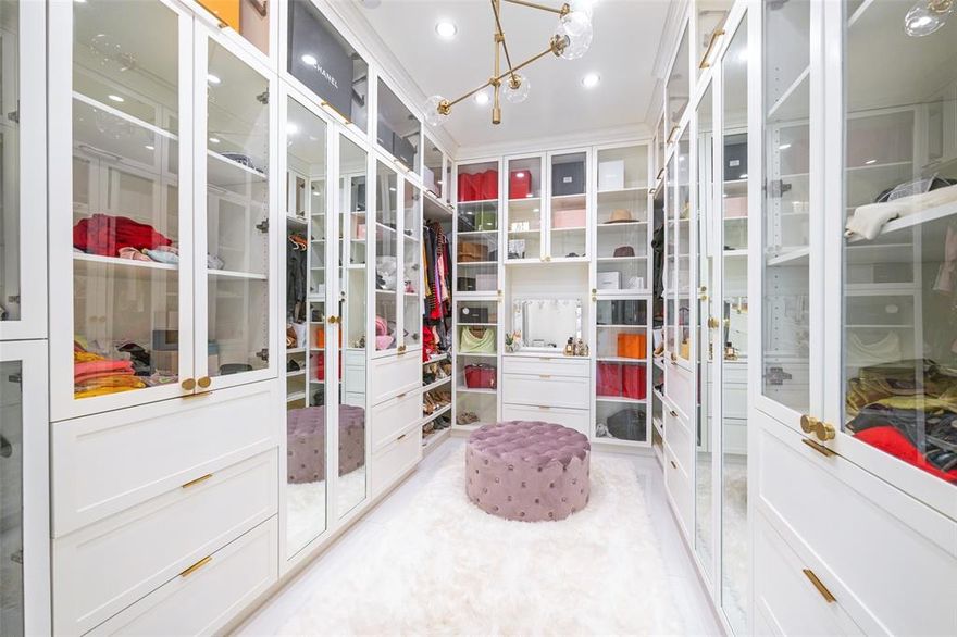 Highly desirable East facing home. Be prepared to be impressed as you step into a tastefully completely re-modeled home with a high end designer finish. Admire the homes features, smart switches, water softener, modern flooring, a stunning chef's kitchen, modern high end appliances, plenty of practical storage, waterfall island, lighted display cabinets, easy to clean cabinets, Carrera tiles, trendy gold hardware, nice sized walk in pantry. The study with views of the pool, or can be used as a guest room. Full guest bathroom is on the 1st level. Painted paneled formal living or dining area, opens into a large gathering space with a beautiful fireplace. The King sized primary bedroom has a see thru fireplace, a designers dream bathroom in a sophisticated color palette and a must have custom closet. Wrought Iron stairs lead to a large game room with 3 beds and 2 baths. The backyard has been reimagined with covered seating, welcoming pool, an outdoor kitchen and bar to unwind and relax.