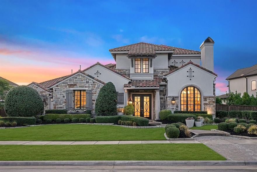 Thoughtfully designed for everyday living and elevated entertaining, this former model Huntington home in Edgestone offers a rare layout with nearly all bedrooms on the main level, creating a highly functional and livable floorplan. The heart of the home centers around an expansive, luxury kitchen, dining, and living space where daily life naturally unfolds. Anchored by Sub-Zero refrigeration, Wolf appliances, a large island, and custom built-ins, the kitchen opens seamlessly to a vaulted living room with wood beams, statement fireplace, and sliding glass doors overlooking the backyard. A true standout is the $70K custom home theater, delivering an immersive experience with projector, surround sound, and built-in media features. A dedicated study-music room with fireplace and custom detailing adds versatility, while plantation shutters throughout bring timeless style and privacy. Upstairs, a spacious game room with wet bar provides the perfect secondary entertainment space. Set on a larger, beautifully landscaped lot with mature trees, the outdoor space is designed for both relaxation and entertaining. The covered patio features a fireplace, motorized screen, and ample room for lounging. A generous pool and spa with water feature, along with grassy areas, creates a private backyard retreat ideal for gatherings. Additional highlights include epoxy-finished garages with EV charging, abundant storage, and seamless indoor-outdoor flow. Located in Frisco’s coveted Edgestone community, residents enjoy trails, parks, fitness amenities, resort-style community pool and close proximity to premier schools, shopping, dining, and the Dallas North Tollway.