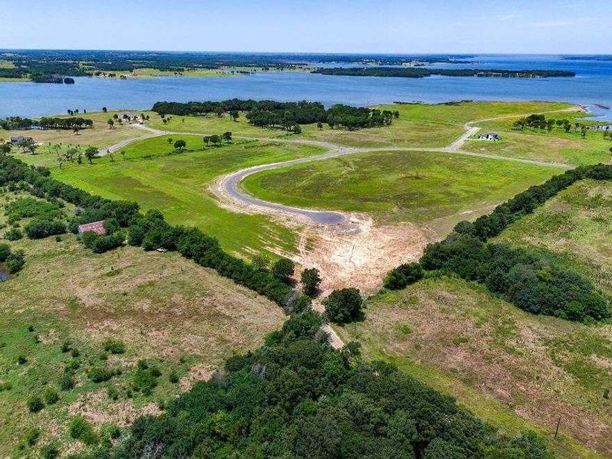 Update: Bois d'Arc Lake Opened to the Public on April 17, 2024 and the Shores at the Peninsula now has paved roads! Welcome to 800 Shores Drive at Bois d'Arc Lake. Explore the potential of this exceptional lake lot in a developing community set to redefine your lifestyle. This prime parcel boasting high elevations not only offers a picturesque setting but is also poised for growth with planned amenities. Picture a future where you can enjoy matches on the upcoming tennis courts or create lasting memories with your furry friend in the planned dog park. Secure your place in a community that values both nature and community, where your property isn't just a home—it's an investment in an evolving, amenity-rich lifestyle. Don't miss the chance to be part of this exciting lakefront development.  The adjacent lake lot 784 Shores Drive is also offered for sale for those interested in purchasing multiple lake lots.