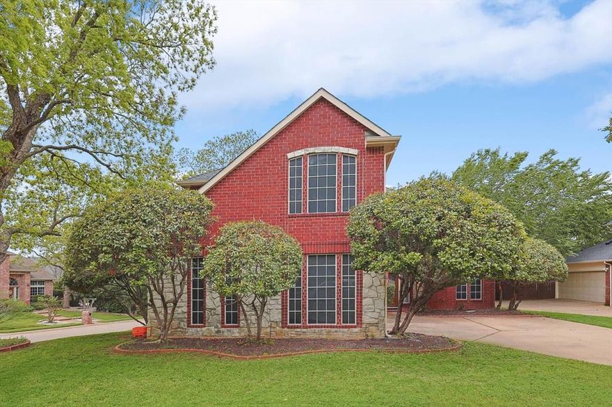 Discover the perfect blend of comfort and style in this tranquil home on a large corner lot in a cul-de-sac in Briarhill Estates.  From the moment you walk in, be prepared to be met by expansive living spaces which include a dual sided fireplace between two large living areas.   The spacious kitchen adjacent to these areas is perfect for entertaining. This home features a downstairs primary bedroom, 2 living areas, 2 dining areas, & 4 upstairs bedrooms, one room can also be used as a large game room if desired. The carefully selected color palette throughout the home adds a touch of class and warmth, creating an inviting atmosphere that you and your guests will feel comfortable in.  Most unique to this home is the backyard sanctuary for those who cherish outdoor living and entertaining. The tiered deck and outdoor kitchen offer a peaceful retreat for enjoying warm evenings and beautiful sunsets. Experience the ideal combination of comfort and luxury in this exquisite home.